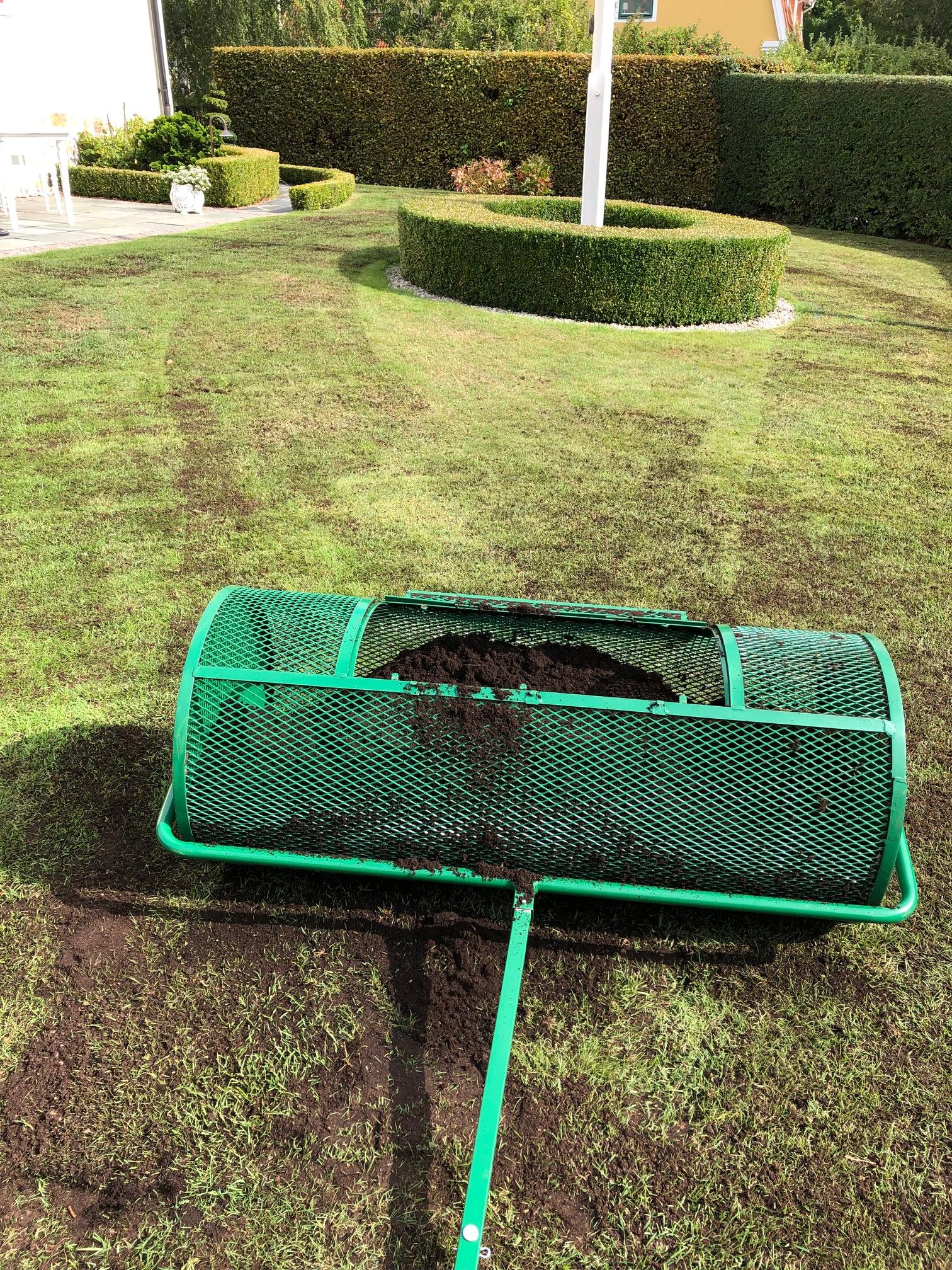 Toppdress av gräsmatta